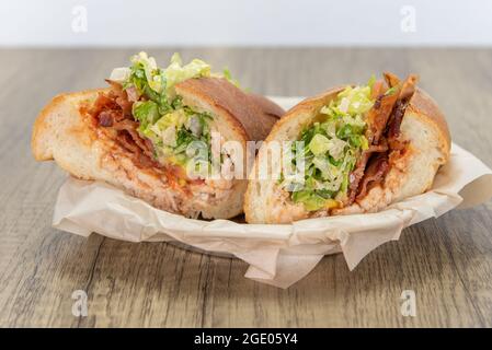 Gorgonzola sandwich cut in half for easy handling while eating this delicious meal. Stock Photo