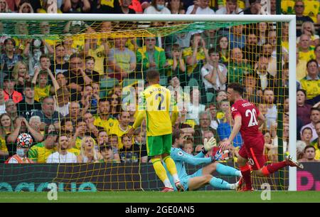 Norwich, UK. 14th Aug, 2021. Diogo Jota of Liverpool turns after scoring the opening goal during the Premier League match between Norwich City and Liverpool at Carrow Road, Norwich, England on 14 August 2021. Photo by Andy Rowland. Credit: PRiME Media Images/Alamy Live News Stock Photo