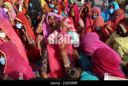 Beawar, India. 14th Aug, 2021. Rajasthani women in veil during Ghotala Rath Yatra on the eve of 75th Independence Day in Beawar, India on August 14, 2021. (Photo by Sumit Saraswat/Pacific Press/Sipa USA) Credit: Sipa USA/Alamy Live News Stock Photo