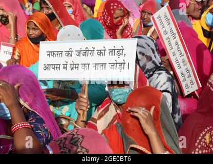 Beawar, India. 14th Aug, 2021. Rajasthani women with placards during Ghotala Rath Yatra on the eve of 75th Independence Day in Beawar, India on August 14, 2021. (Photo by Sumit Saraswat/Pacific Press/Sipa USA) Credit: Sipa USA/Alamy Live News Stock Photo