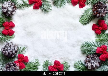 Christmas wreath with red bows and cones. Holiday concept. Stock Photo