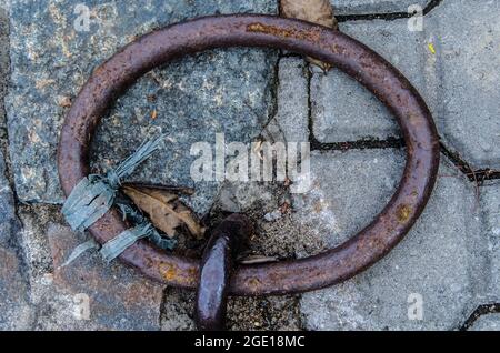 Dirty old iron texture on the floor. City of Cachoeira, Bahia, Brazil. Stock Photo