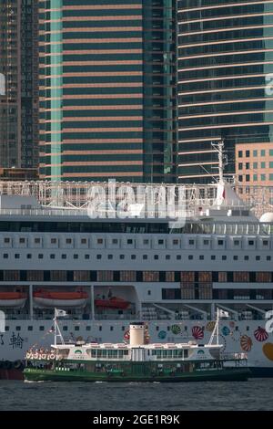 The 'Shining Star', a reproduction third generation Star Ferry, carries tourists on a pleasure cruise on Victoria Harbour, Hong Kong Stock Photo