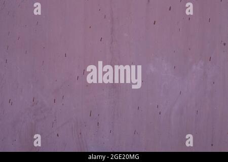 Old wooden board. Background in form of gray metal-painted decorative wall with spots and markers from age Stock Photo