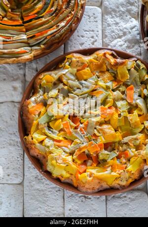 Vegetable pie made from carrots, eggplant and zucchini. Squash tart Stock Photo