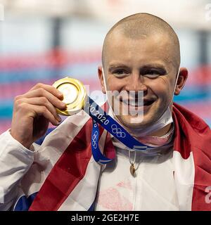 Tokyo, Kanto, Japan. 26th July, 2021. Adam Peaty of (GBR) wins the Gold Medal in Men's 100m Breaststroke Final during the Tokyo 2020 Olympics at the Tokyo Aquatics Centre on Monday, July 26, 2021 in Tokyo. (Credit Image: © Paul Kitagaki Jr./ZUMA Press Wire) Stock Photo