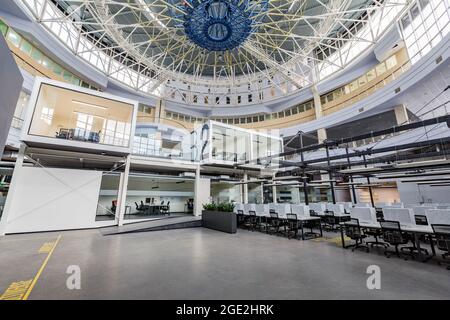 Big rental office with wrapped computers and without workers Stock Photo