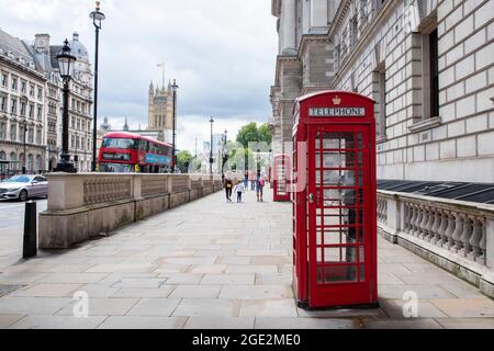 Iconic red phone boxes on Whitehall in London, England UK Stock Photo