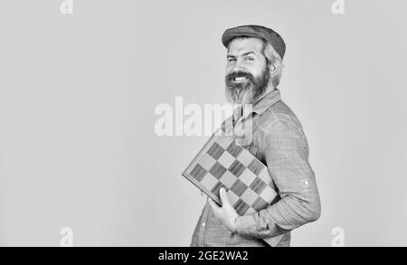 human brain working. brainstorming concept. play chess tournament. Intelligence level measurement. level up your iq. bearded man hold chess board Stock Photo