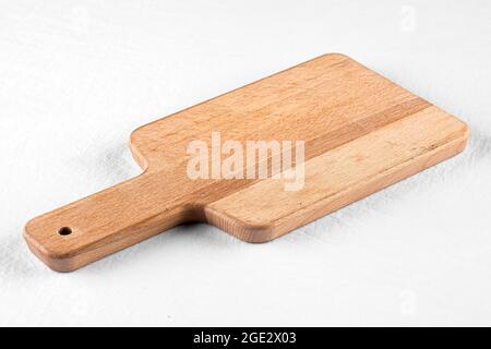 Isolated wooden cutting board on white background Stock Photo
