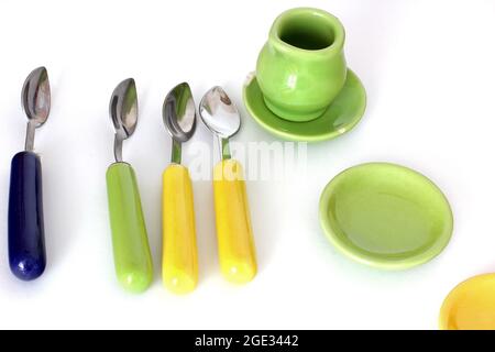 Toy dishes on a white background Stock Photo