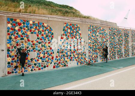 Colourful climbing wall on promenade, Whitmore Bay, Barry Island, South Wales, 2021 Stock Photo