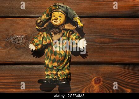 Clown on wooden background Stock Photo