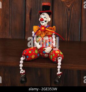 Clown on wooden background Stock Photo