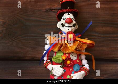 Clown on wooden background Stock Photo