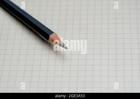 https://l450v.alamy.com/450v/2ge3a53/black-pencil-and-note-pad-on-white-background-2ge3a53.jpg