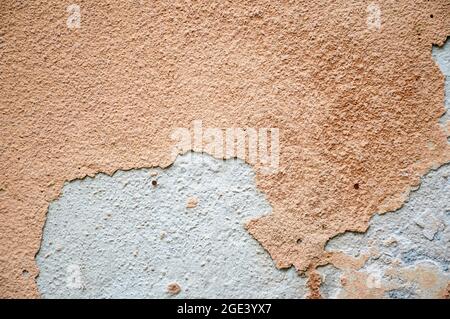 Old concrete wall with peeling plaster Stock Photo