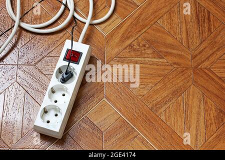 extension cord On the floor. Stock Photo