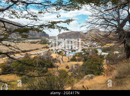 View between the trees of the town El Chalten. Stock Photo