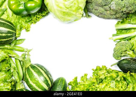 Green vegetables on white background with copy space Stock Photo
