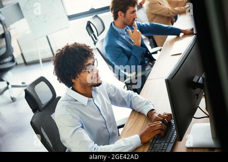 Programmer working in a software developing company Stock Photo