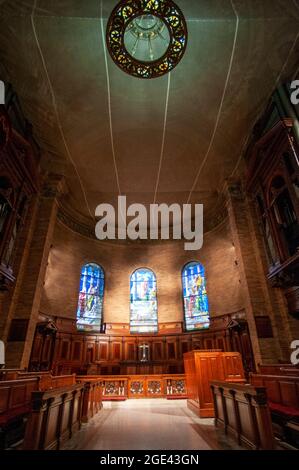 Inside of Columbia University's St. Pauls Chapel (1907), looking toward the apse. It clad in red brick and limestone.   In 1894, the architect Charles Stock Photo