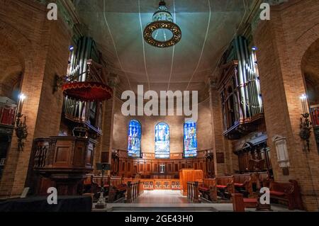 Inside of Columbia University's St. Pauls Chapel (1907), looking toward the apse. It clad in red brick and limestone.   In 1894, the architect Charles Stock Photo