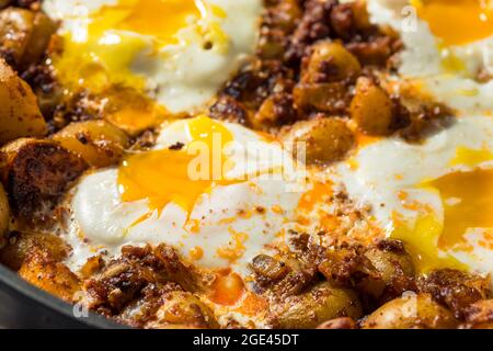 Homemade Mexican Huevos Rotos Eggs and Potatoes with Chorizo Stock Photo