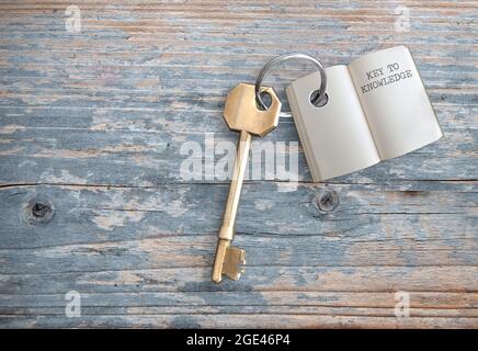 Keyring with open book key to knowledge Stock Photo