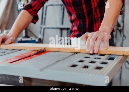 Caucasian male carpenter working in a workshop Stock Photo
