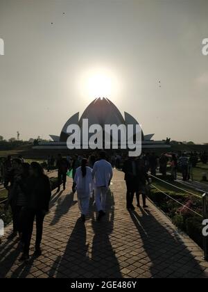 DELHI, INDIA - JUNE 14, 2017: Bahai house of Worship popularly known as the Lotus Temple due to its Lotus like structure at sunset in New Delhi, India Stock Photo