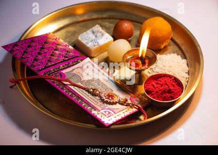 Close-up Rakhi kept in a decorative thali on the occasion of Rakshabandhan Stock Photo