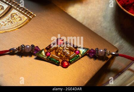 Close-up Rakhi kept in a decorative thali on the occasion of Rakshabandhan Stock Photo