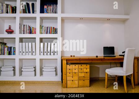 Computer display and office tools on desk. Front view blank desktop computer screen. Stock Photo