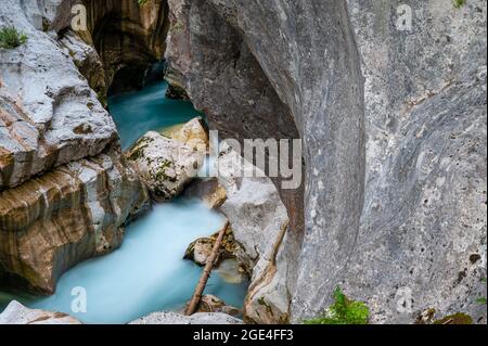 Beautiful blurred river of Soca, Slovenia, flowing through big gorges. Stock Photo