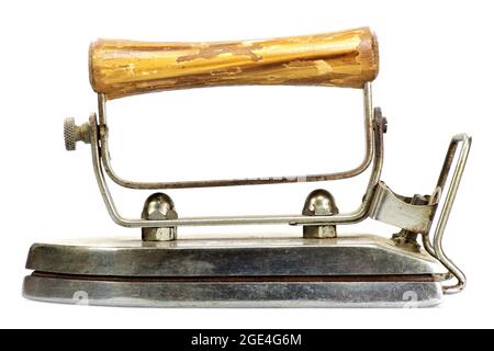 vitage electric flatiron with wooden handle isolated on white background Stock Photo
