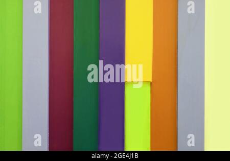 Multi-colored vertical stripes patterned wooden wall for abstract background Stock Photo