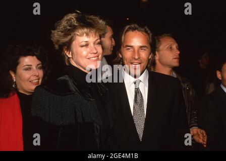 CENTURY CITY, CA - DECEMBER 19: Actor Don Johnson and actress Melanie Griffith attend the 'Working Girl' Century City Premiere on December 19, 1988 at 20th Century Fox Studios in Century City, California.  Credit: Ralph Dominguez/MediaPunch Stock Photo