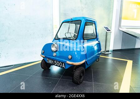 The Peel P50 is the smallest ever produced car in the world. The motor was from a DKW motorbike. From Audi Museum Mobile. Stock Photo