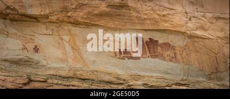 Panorama of the petroglyphs on the Temple Mountain Wash Pictograph Panel in Utah. Stock Photo