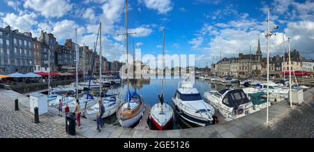 Honfleur, France - July 28, 2021: Honfleur is a french commune in the Calvados department and famous tourist resort in Normandy. Especially known for Stock Photo