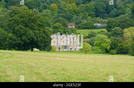 Rainscombe House, Oare Wiltshire. A 19th Century grade II listed country estate property with parkland and grounds Stock Photo