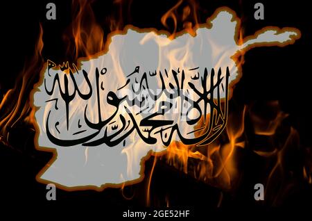 Afghanistan outline map and Taliban insignia with burning fire background. Afghanistan problem concept. Stock Photo