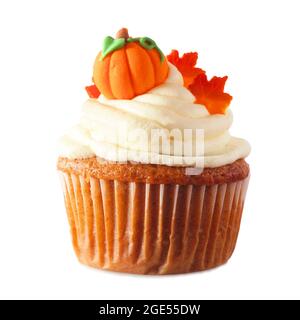 Fall pumpkin spice cupcake with creamy frosting and leaf and pumpkin toppings isolated on a white background Stock Photo