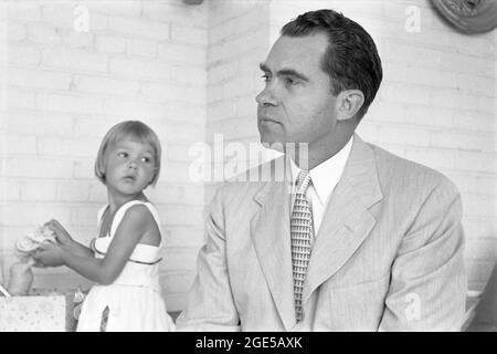 California Senator Richard Milhous Nixon, who would later become the 36th U.S. Vice President (under Eisenhower) and the 37th U.S. President,  with his daughter in July, 1952. (USA) Stock Photo