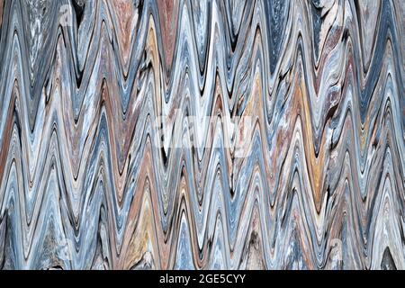 Abstract background of multi-colored vertical zigzags. Top view. Stock Photo