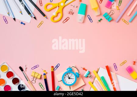 School supplies on wooden desk. Kid creativity flat lay Stock