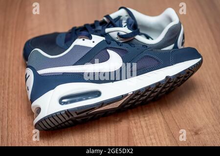 Norwich, Norfolk, UK – August 16 2021. Close and selective focus on navy blue Nike Air Max trainers or sneakers for men Stock - Alamy