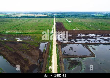 Peat extraction aerial photo, Esterweger Dose in Emsland, drone photo, area shortly after extraction, renaturation, Lower Saxony, Germany Stock Photo