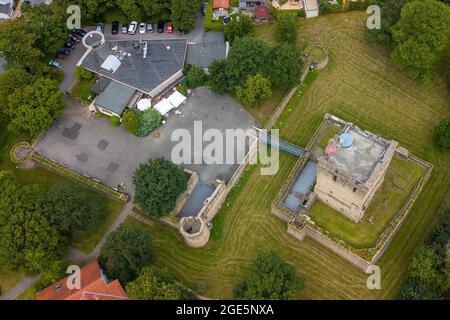 Bird's-eye view of ruins of partly reconstructed former moated castle Altendorf from the Middle Ages, on the left place of destroyed outer castle Stock Photo